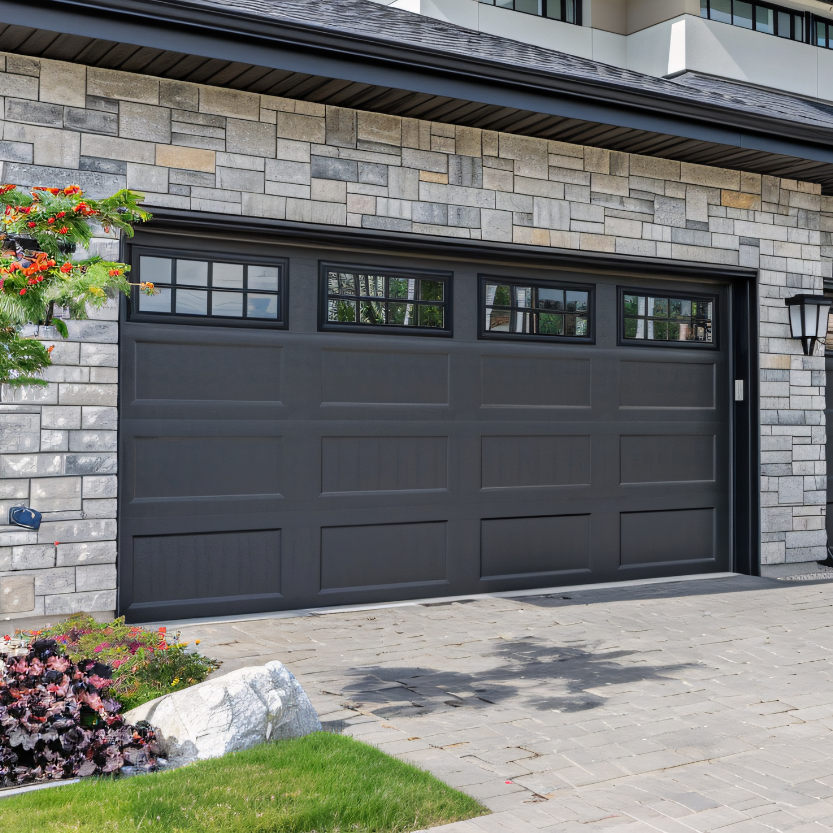 Modern San Diego home with custom dark garage door installed by Open Sesame